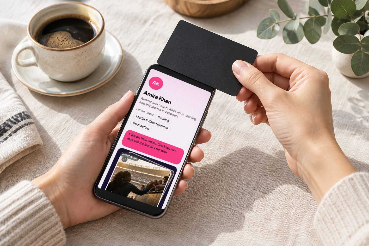 A card tapped against a phone, which opens a NexusG8 Professional Page